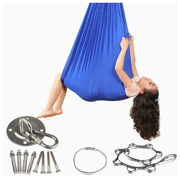 Neurodivergent child using indoor sensory cocoon swing — therapy swing for autism, ADHD and sensory processing disorder recommended by occupational therapists