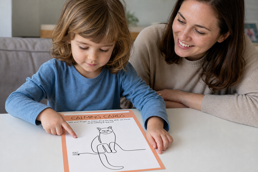 Child tracing one-line animal drawing on calming card — mindful breathing sensory tool for ADHD, autism, and sensory processing disorder